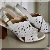 H12. Cole Haan white heels. 